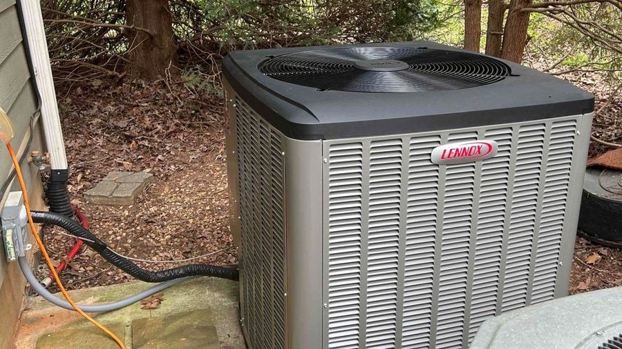 New air conditioner installed outside home.