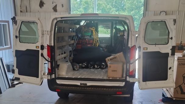 Open ZAP van ready for indoor air quality testing appointment.