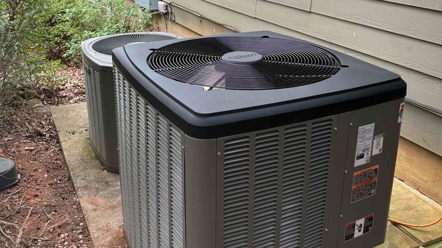 AC units sitting outside house.