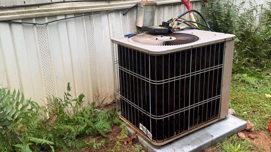 AC unit with tools on top in Murrayville.